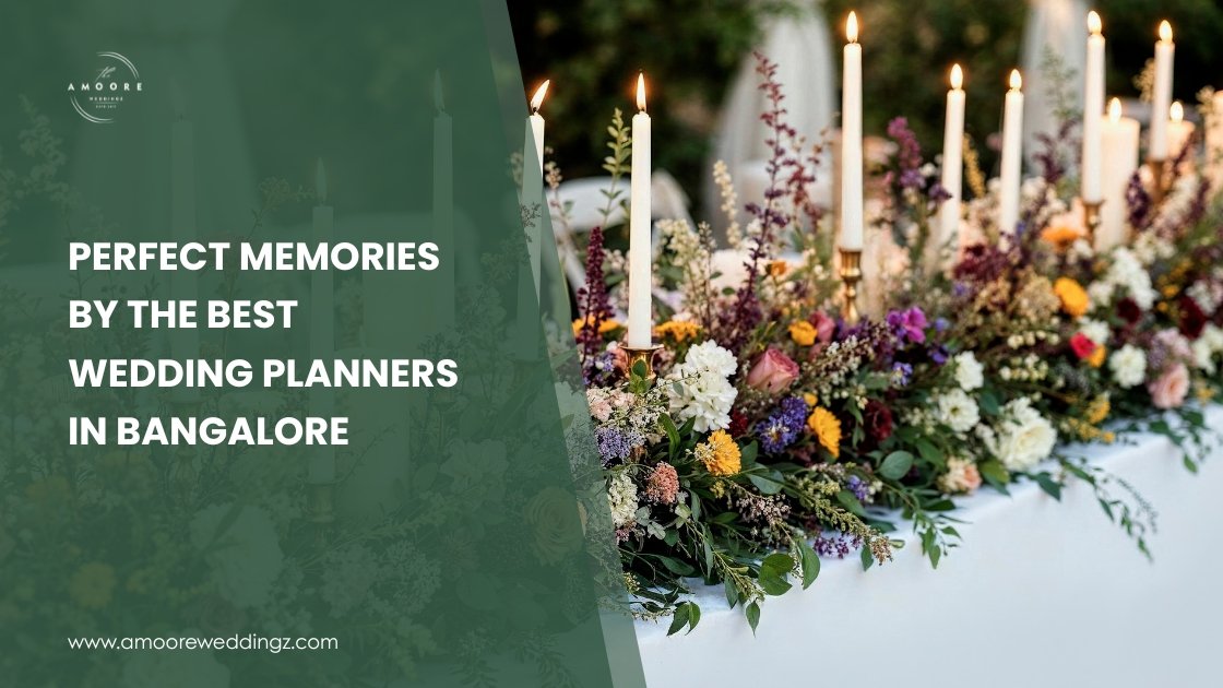 Elegant wedding table centerpiece with colorful fresh flowers and tall candles arranged by top wedding planners in Bangalore