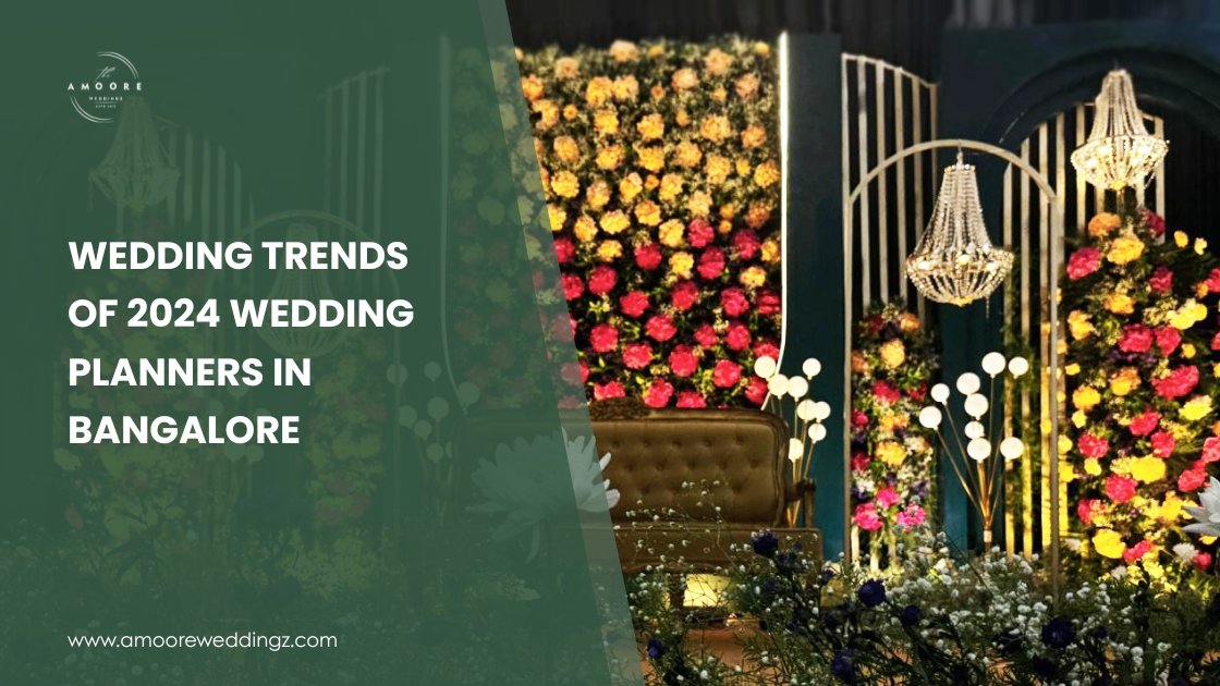 Vibrant wedding stage with colorful floral backdrop, golden chandeliers, and modern lighting—showcasing top 2024 wedding trends by planners in Bangalore.